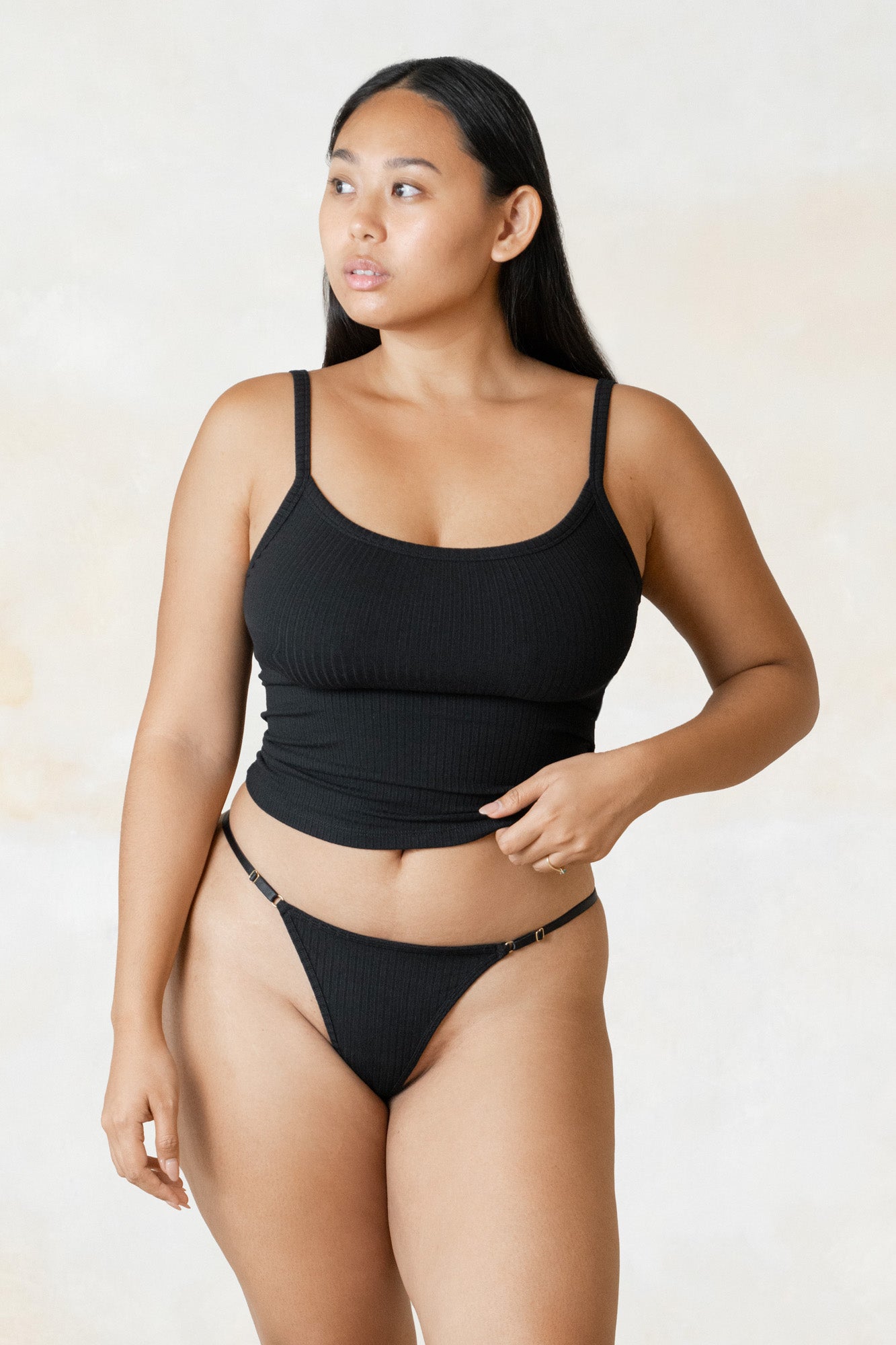 Studio K Rib One Shoulder Top in Black – sustainable, stylish, and comfortable yoga and lounge wear, available in multiple sizes.